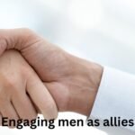 Handshake between two people with the caption 'Engaging men as allies' as a message of allyship and collaboration.